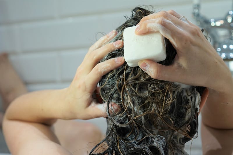 Washing hair with natural shampoo bar