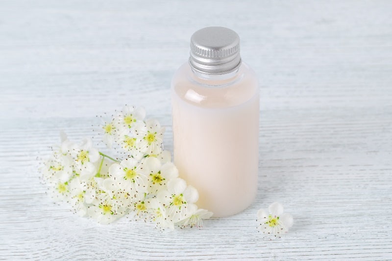 Natural shampoo bottle with flowers